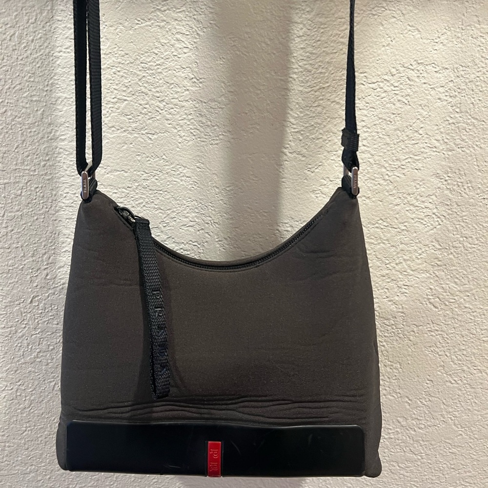 Prada Black Crossbody Bag with Subtle Red Accent